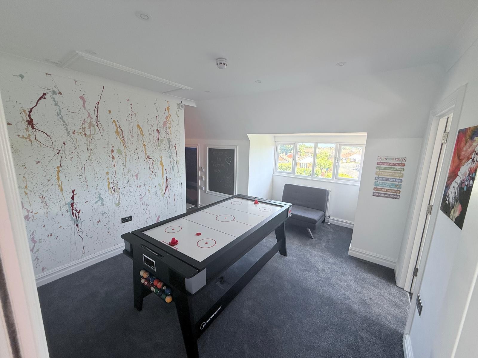 Victoria House games room with air hockey table